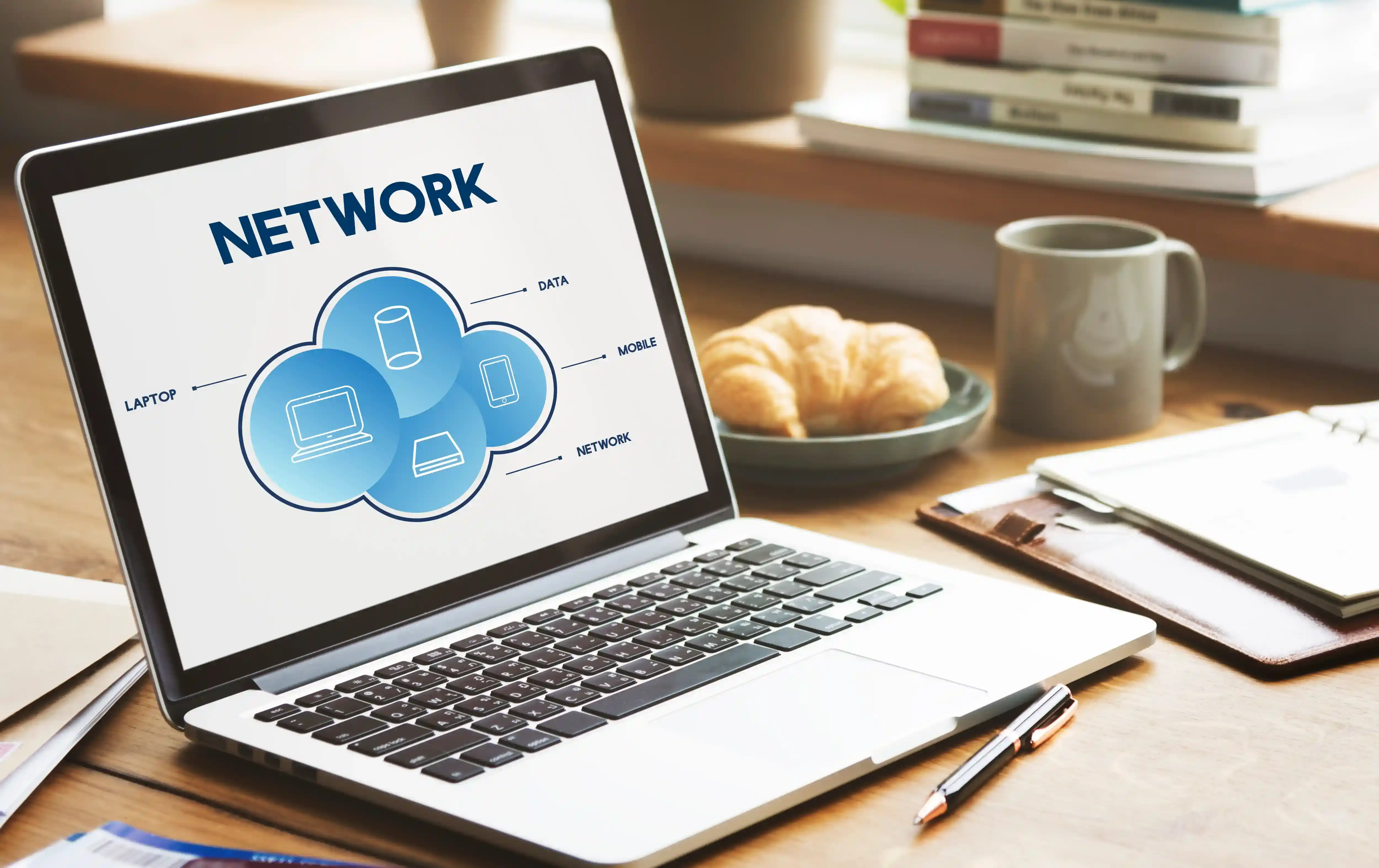 Laptop displaying a network connection diagram for remote access