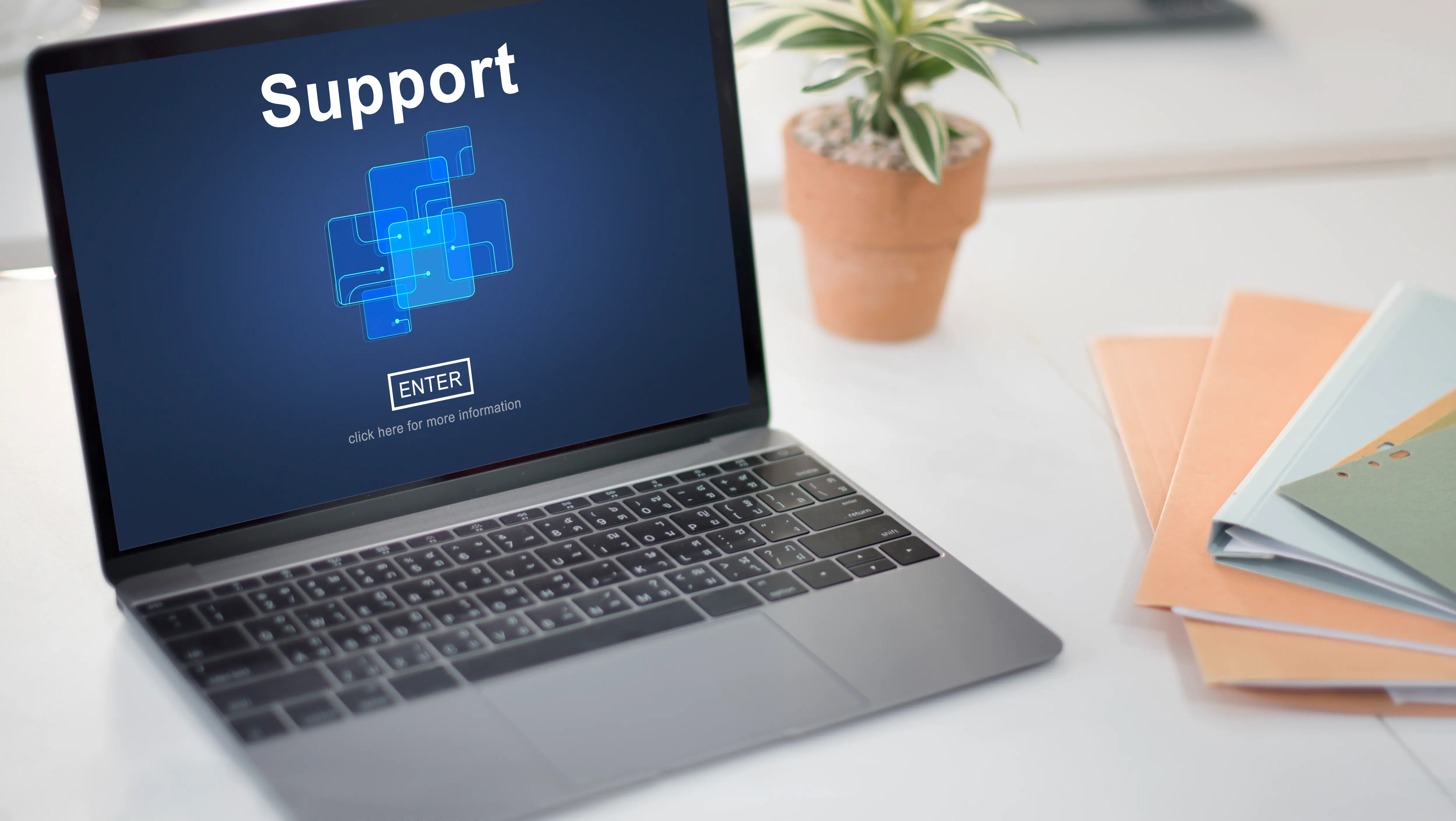 Laptop displaying an online support and assistance page